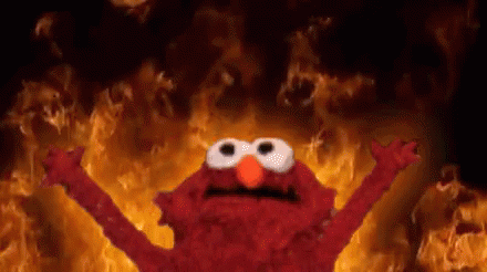 Elmo with flickering flames behind